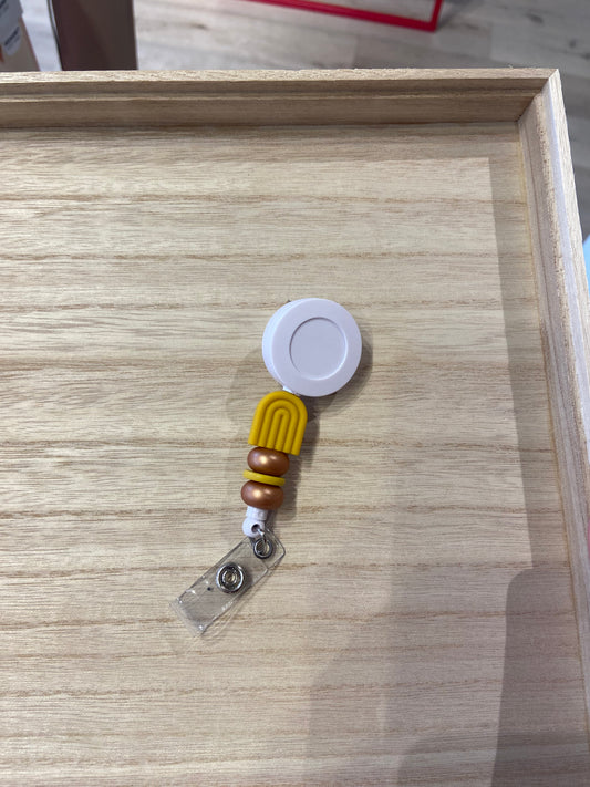 Badgehouder met trekkoord regenboog