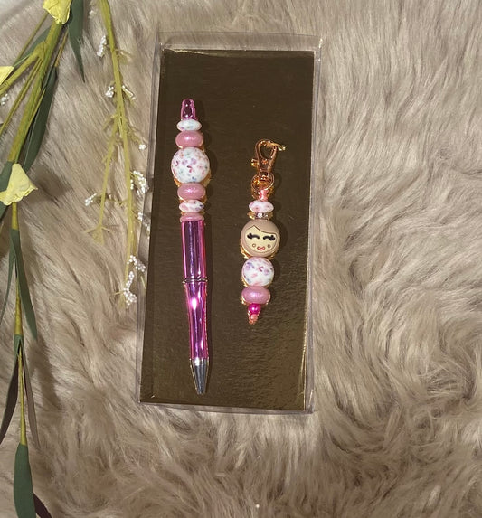 Popje van geluk met pen